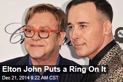 Elton John Puts a Ring On It