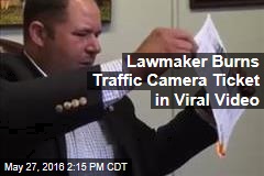 Lawmaker Burns Traffic Camera Ticket in Viral Video