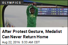 After Protest Gesture, Medalist Can Never Return Home
