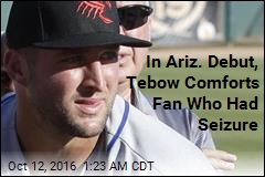 Tebow Comforts Ill Fan in Arizona League Debut