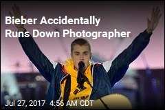 Bieber Accidentally Drives Into Photographer