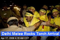 Delhi Melee Rocks Torch Arrival