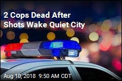 2 Cops Dead After Shots Wake Quiet City