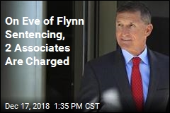 On Eve of Flynn Sentencing, 2 Associates Are Charged