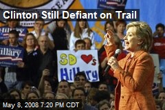 Clinton Still Defiant on Trail