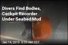 Divers Find Crashed Jet&#39;s Cockpit Recorder