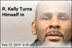 R. Kelly Turns Himself In
