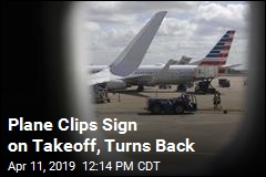 Plane Clips Sign on Takeoff, Turns Back