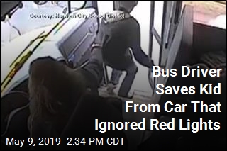 Bus Driver Saves Kid From Car That Ignored Red Lights