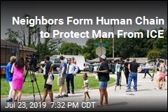 Neighbors Form Human Chain to Protect Man From ICE