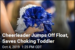 Cheerleader Jumps Off Float, Saves Choking Toddler