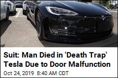 Suit: Man Died in &#39;Death Trap&#39; Tesla Due to Door Malfunction