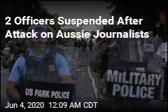 2 Officers Suspended After Attack on Aussie Journalists
