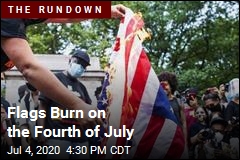 Flags Burn on the Fourth of July