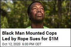Black Man Police Led by Rope Sues for $1M