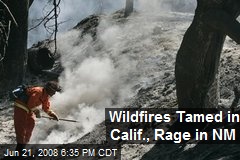 Wildfires Tamed in Calif., Rage in NM