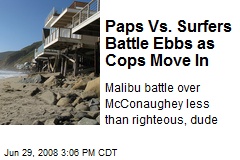 Paps Vs. Surfers Battle Ebbs as Cops Move In