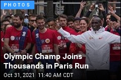 Olympic Champ Joins Thousands in Paris Run