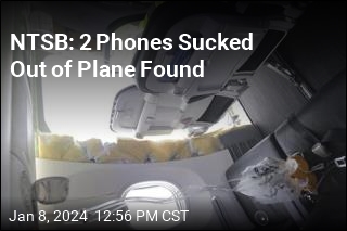 NTSB: 2 Phones Sucked Out of Plane Found