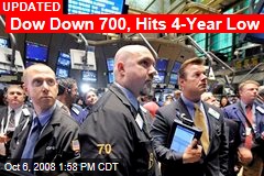 Dow Down 700, Hits 4-Year Low
