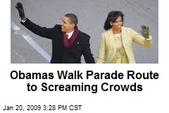 Obamas Walk Parade Route to Screaming Crowds