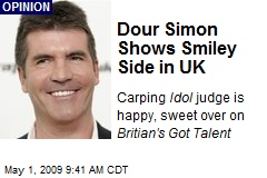 Dour Simon Shows Smiley Side in UK
