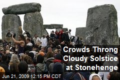 Crowds Throng Cloudy Solstice at Stonehenge
