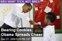 Bearing Cookies, Obama Spreads Cheer