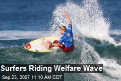 Surfers Riding Welfare Wave