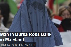 Man In Burqa Robs Bank