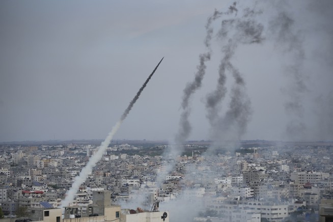 Hamas surprise attack out of Gaza stuns Israel and leaves hundreds dead in fighting, retaliation