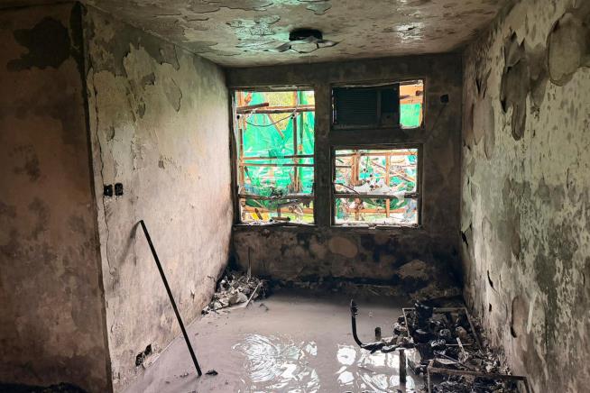 Hong Kong fire probe reveals unsafe netting as public mourns and government stifles dissent