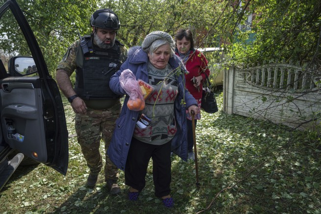 Russia says it has captured 5 villages in northeast Ukraine as more than 1,700 civilians flee