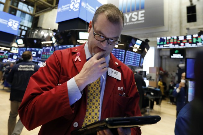 Markets Right Now: Stocks slide after Apple sees China slump