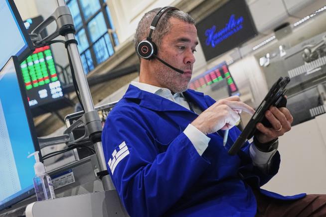 Wall Street swings through another erratic day ahead of a couple of crucial tests