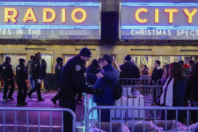 The Rockefeller Center Christmas tree lights up in New York City