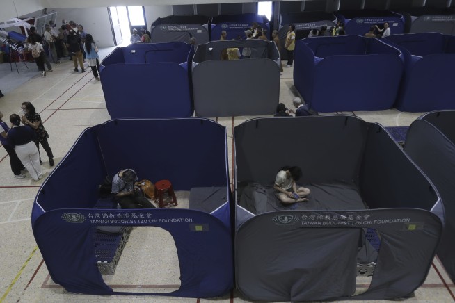 Rescuers in Taiwan search for those missing or stranded after major earthquake kills 10