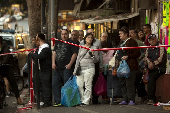 Palestinian attacks kill American tourist, wound 12 Israelis