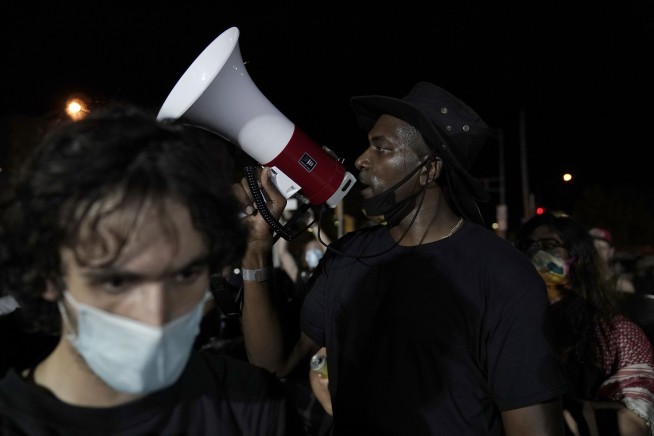 Kenosha protests peaceful after night of chaos and shootings