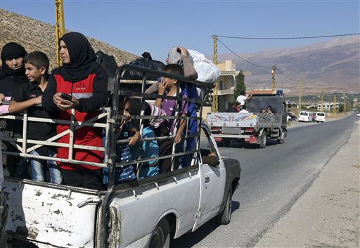 Thousands flee as Lebanon battles Syrian militants