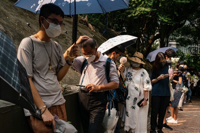In Hong Kong, public grief over queen doubles as dissent