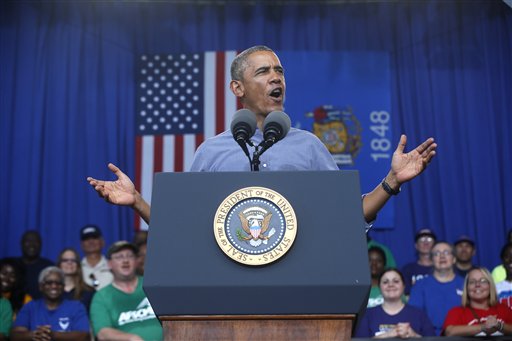 Obama: 'Revving' economy calls for higher wages