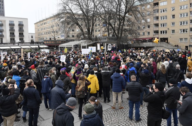 Hundreds in Stockholm protest Sweden's virus restrictions