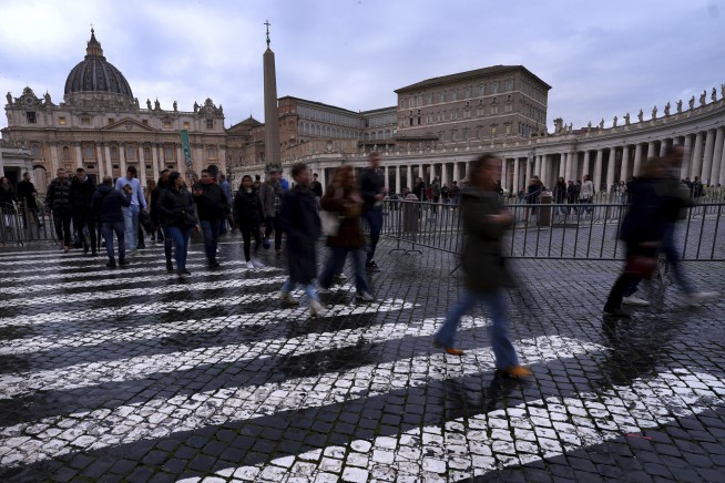 Pope Francis shows slight improvement and resumes some work, while still critical, Vatican says