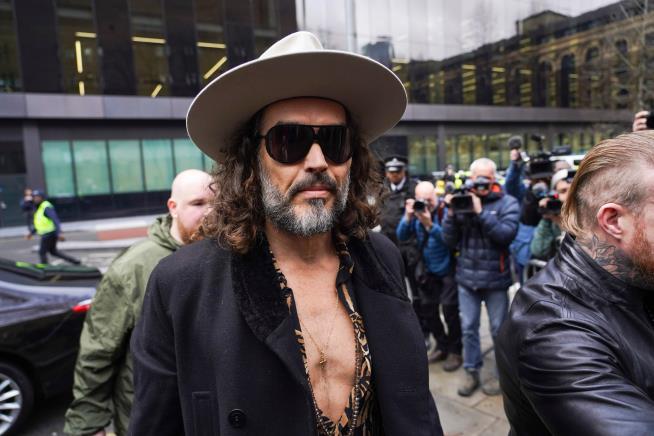 British comedian Russell Brand pleads not guilty to new rape and sexual assault charges