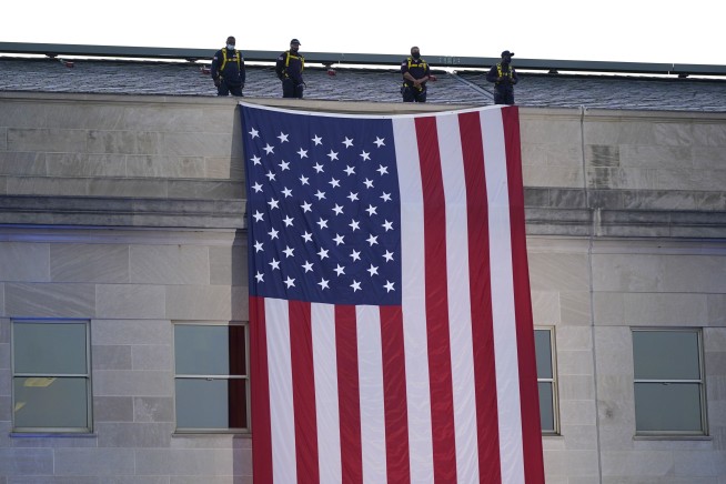 The Latest: Bush notes 'sudden splendor' of bravery on 9/11