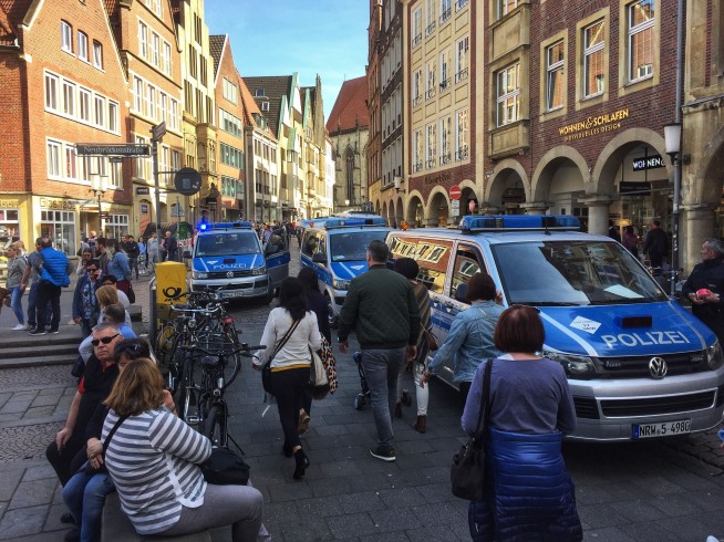 Germany seeks motive after van crashes into crowd, killing 2