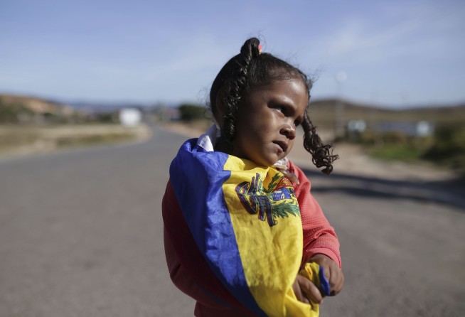 The Latest: Guaido sends aid into Venezuela from Brazil