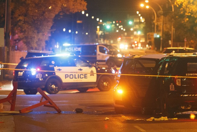 'Lone wolf' suspected in Canada terror attack, police chase