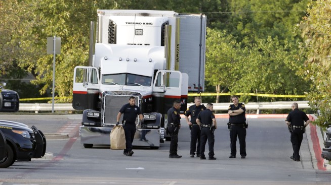 The Latest: Truck driver charged with human trafficking